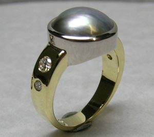 Pearl and diamond dress ring