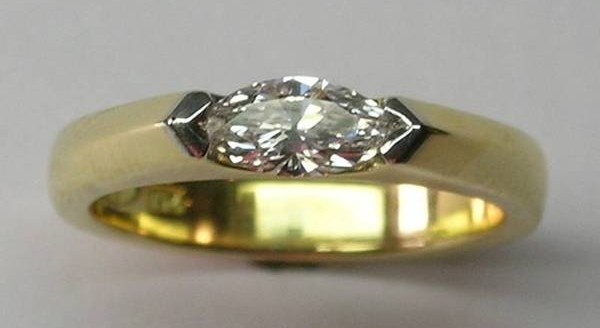 Solitaire marquise diamond engagement ring