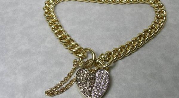 Gold bracelet with diamond set padlock