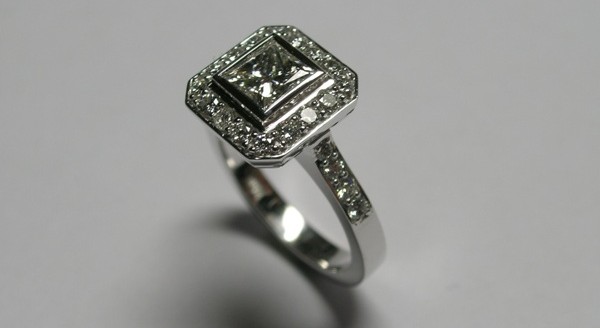 Princess cut diamond halo engagement ring