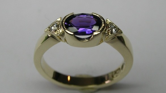 Natural purple sapphire and diamond dress ring