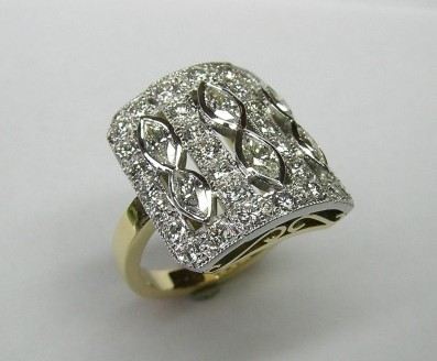 Antique style marquise and brilliant cut diamond dress ring