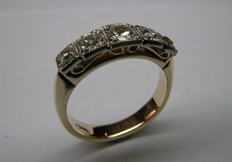 Five diamond antique style ladies occasion ring