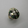 Emerald and diamond ladies dress ring