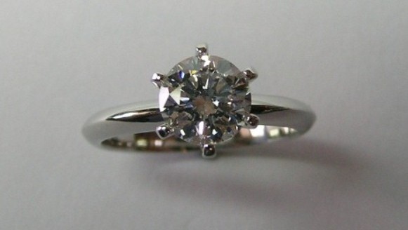 Elegant platinum solitaire diamond engagement ring